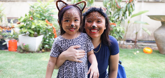 Child and mother dressed up for Halloween