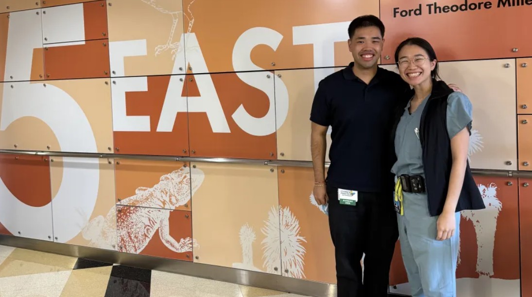 Jason Atienza, RN, next to his sister, Jamie Atienza, MD