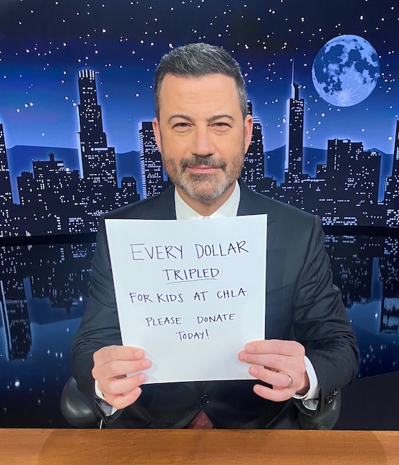 Photo of Jimmy Kimmel with sign: Every dollar TRIPLED for kids at CHLA. Please donate today!